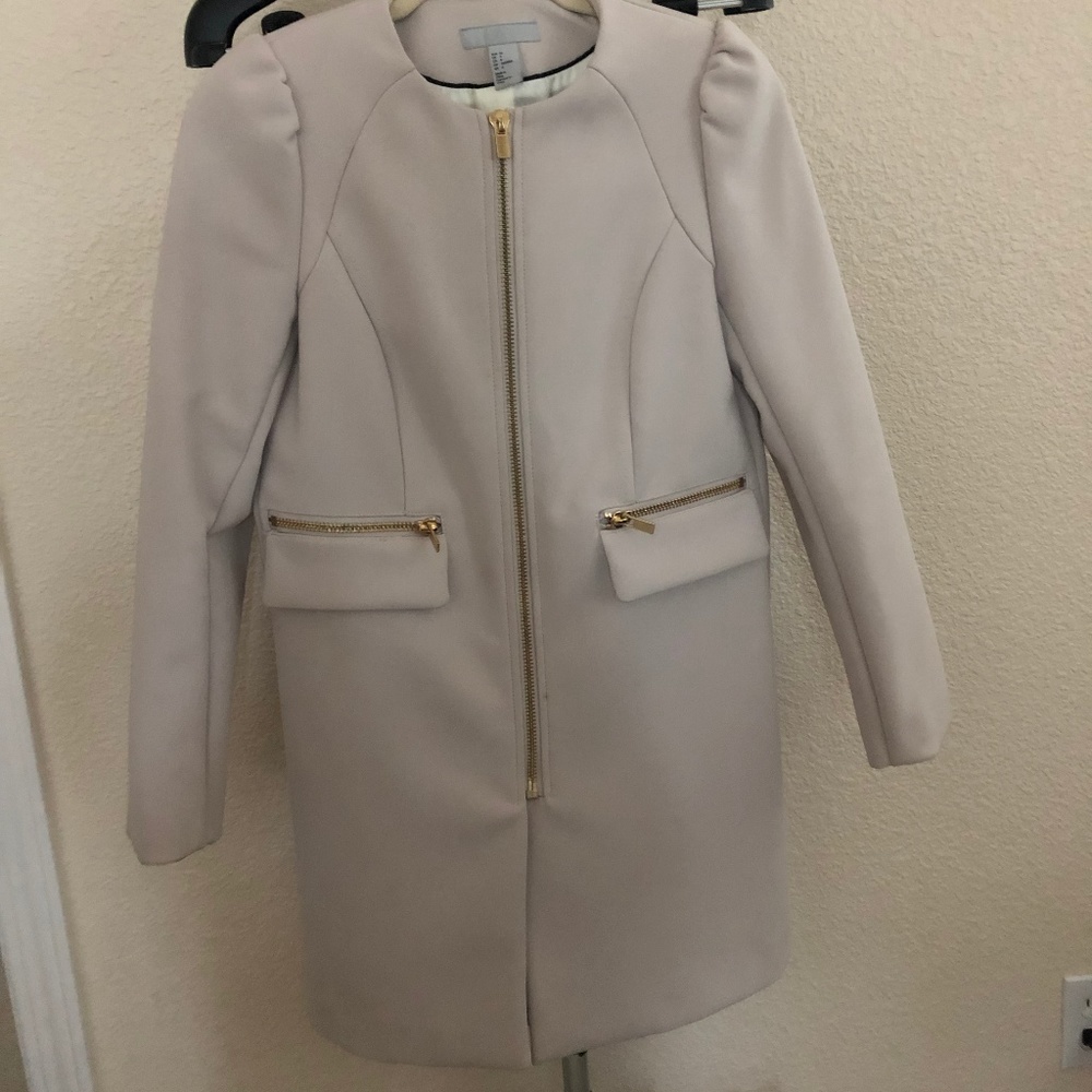 Coat with gold accents